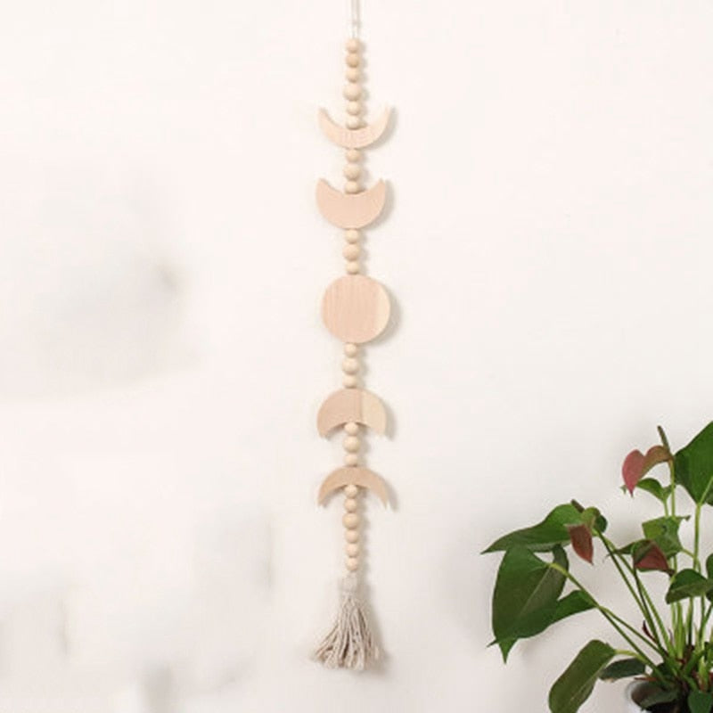 La Lune moon phase hanging with tassel on a wall