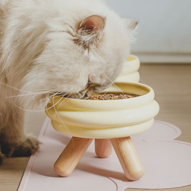 Le Tabouret: Ringed ceramic bowl on wooden legs