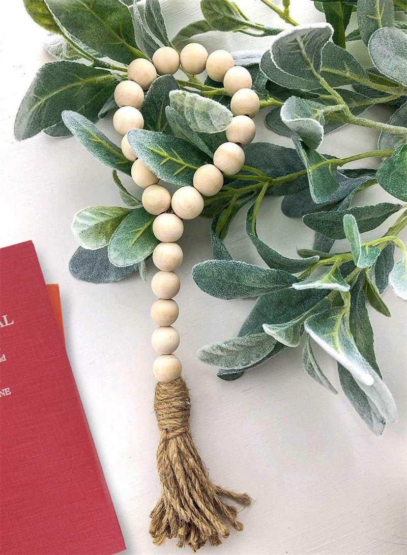 Les Trois Boucles bead loop beside greenery