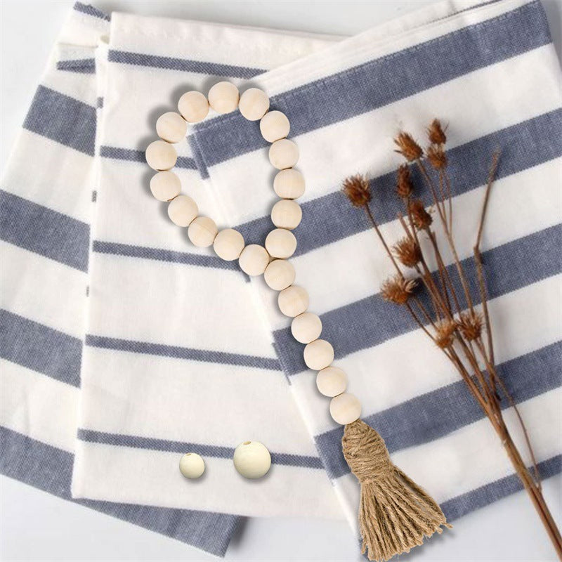 Les Trois Boucles bead loop on striped linen