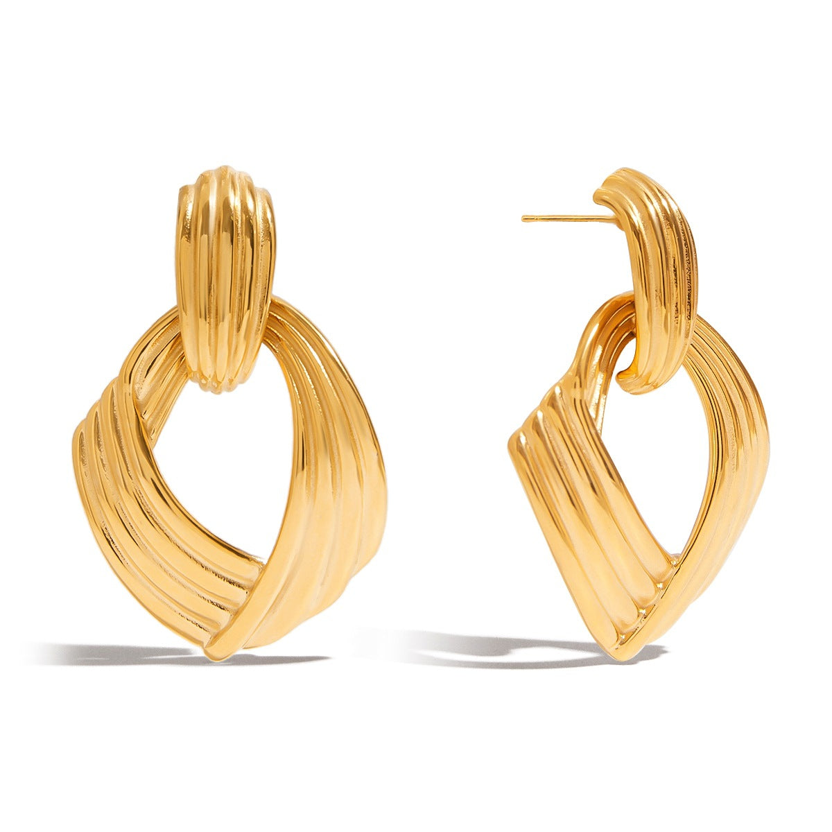 Le Ruban d'Or earrings, pair on white