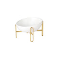 Le Trombone: Tilted ceramic bowl on a gold-tone stand