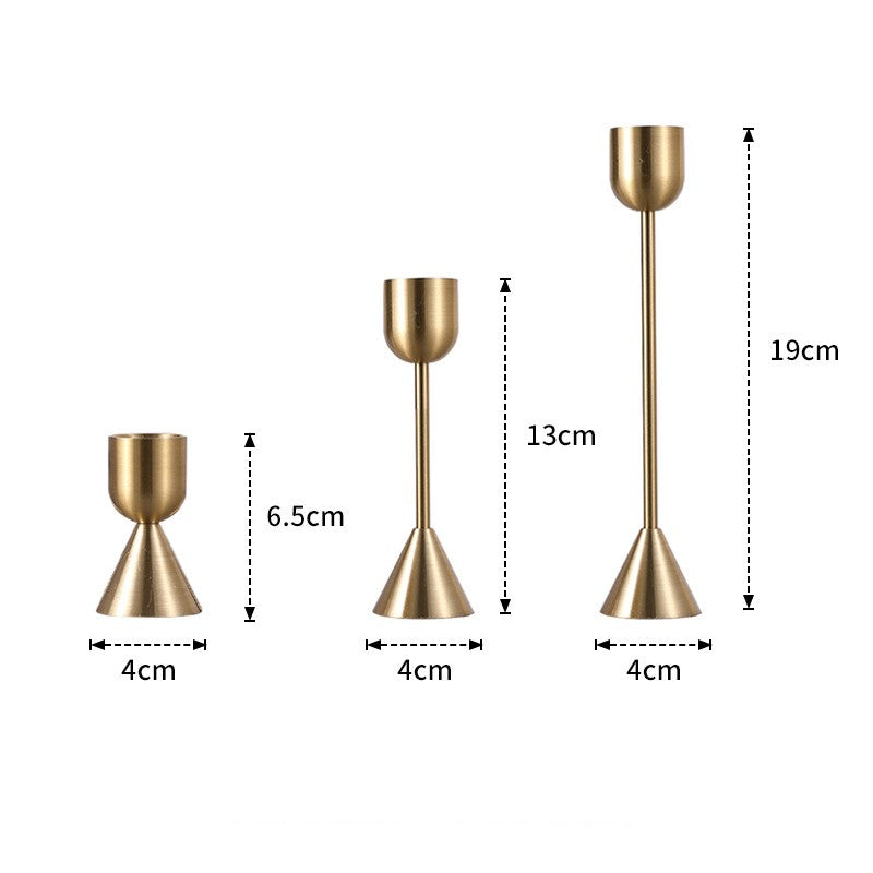 Les Trois Flammes: Gold-tone taper candle holders, set of three