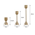 Les Trois Flammes: Gold-tone taper candle holders, set of three