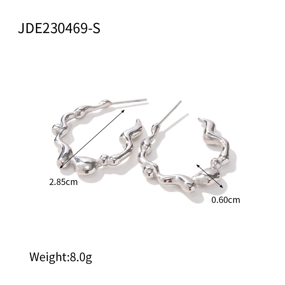 L'Onde: Wavy open hoop earrings