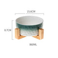 Le Grès: Glazed ceramic bowl on a bamboo stand
