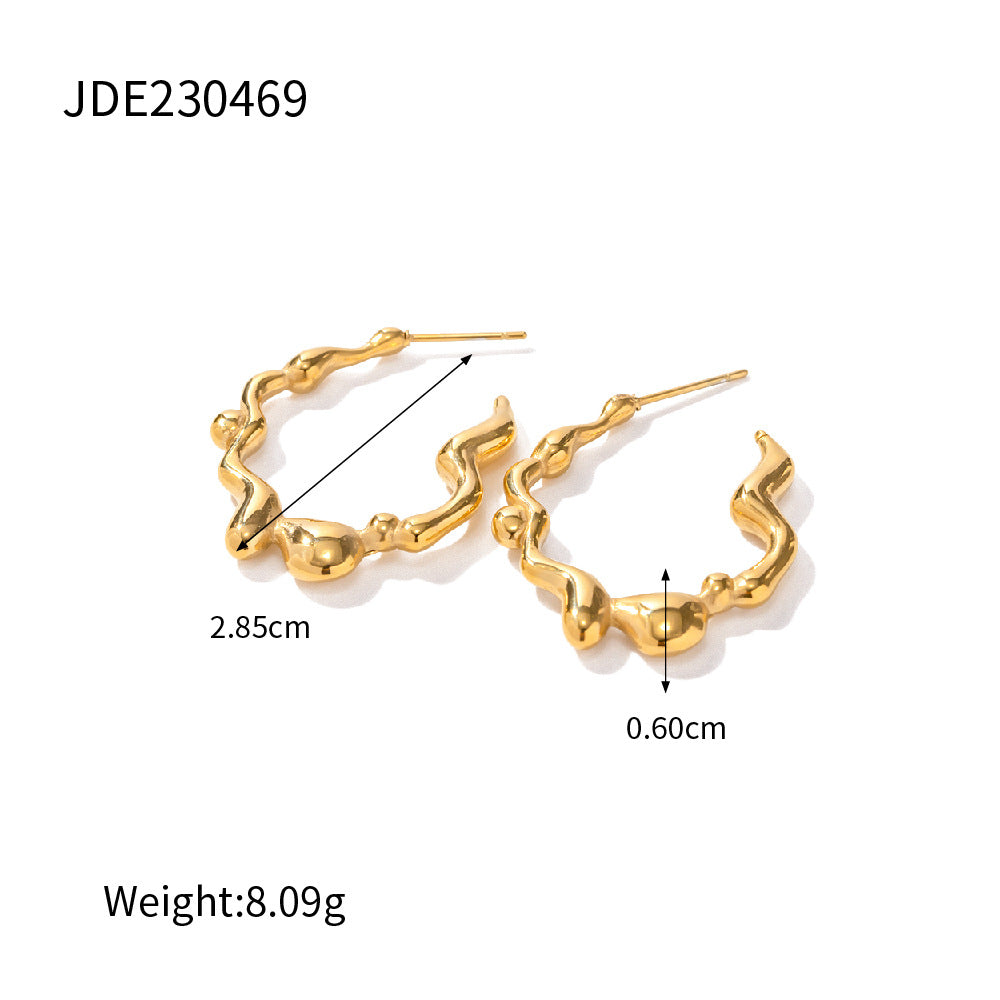 L'Onde: Wavy open hoop earrings