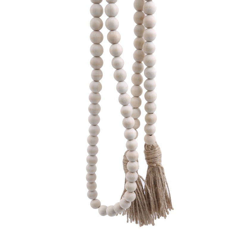 Le Chapelet wooden bead garland with jute tassels