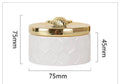 L'Abeille: White porcelain jar with gold bee lid