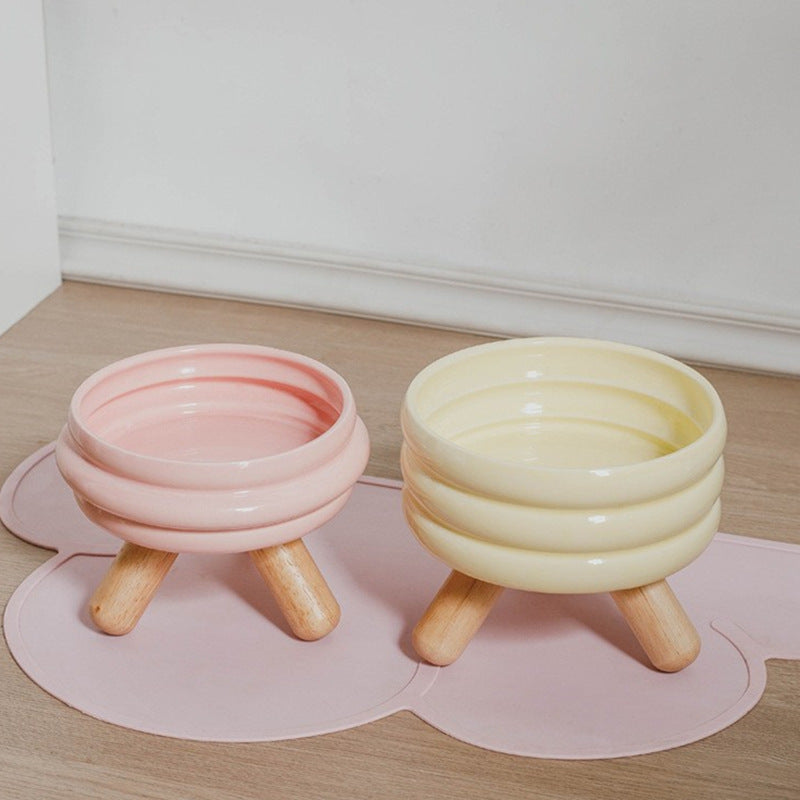 Le Tabouret: Ringed ceramic bowl on wooden legs